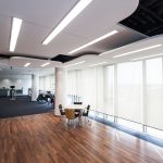 Modern office with design lighting and wooden floor in Urbana, MD