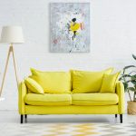 living room with yellow sofa